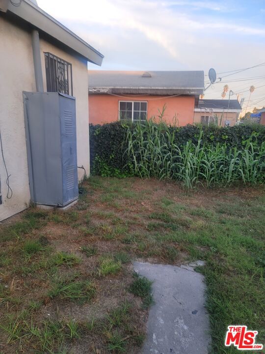 Residential Income for sale at 7908 Towne Avenue, Los Angeles CA featuring 5 beds and 3 baths