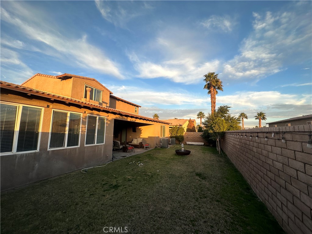 Residential for sale at 82837 Angels Camp Drive, Indio CA featuring 5 beds and 4 baths