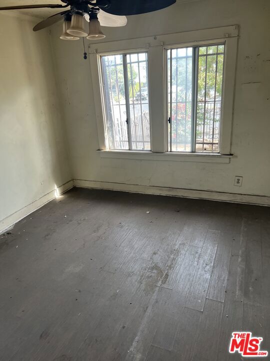 Residential Income for sale at 1733 S Longwood Avenue, Los Angeles CA featuring 3 beds and 2 baths