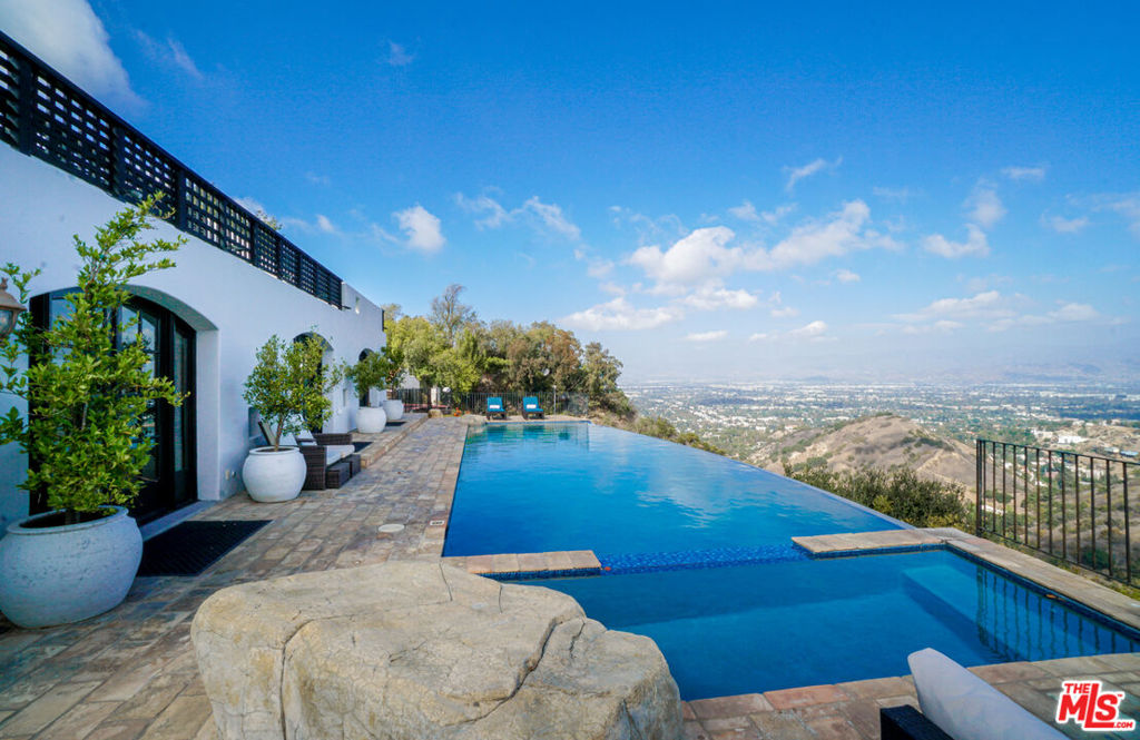 Residential Lease for rent at 13211 Mulholland Drive, Beverly Hills CA featuring 5 beds and 3 baths