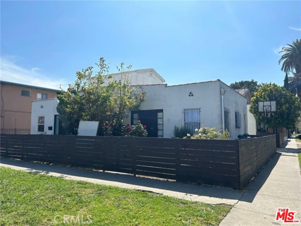 Residential Income for sale at 2701 S Cloverdale Avenue, Los Angeles CA featuring 5 beds and 3 baths