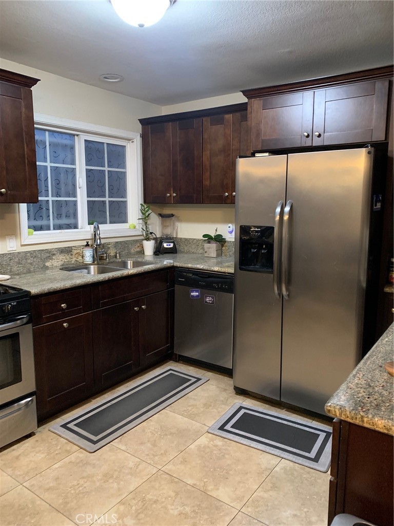 Residential for sale at 10316 S San Pedro Street, Los Angeles CA featuring 3 beds and 2 baths