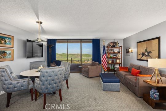 Residential for sale at 24055 Paseo Del Lago 1207, Laguna Woods CA featuring 2 beds and 2 baths