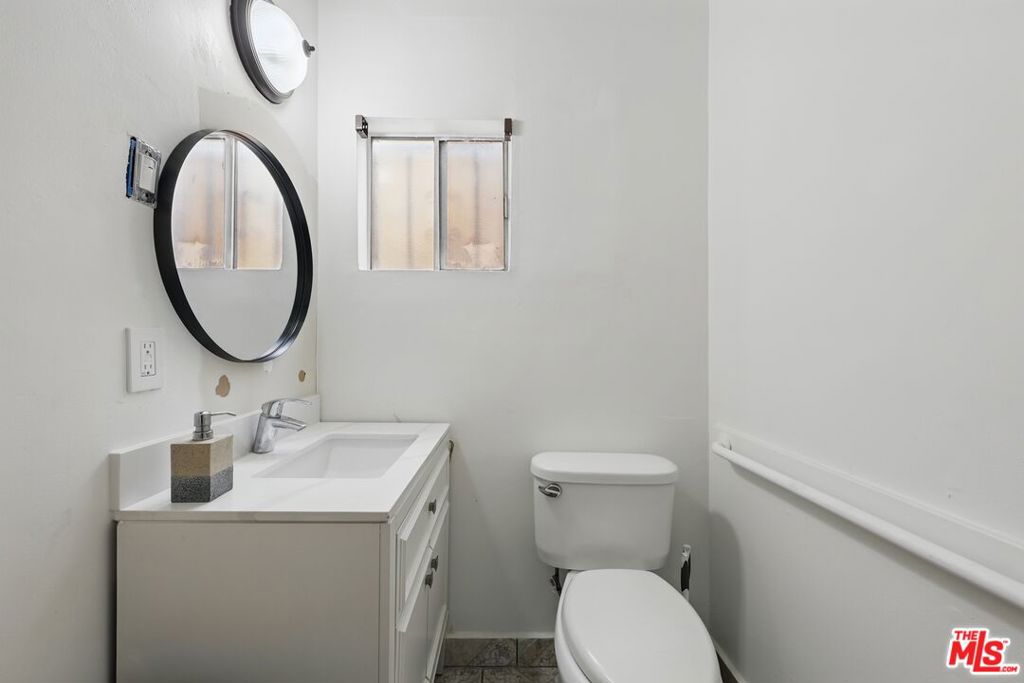 Residential Income for sale at 6617 S San Pedro Street, Los Angeles CA featuring 3 beds and 5 baths