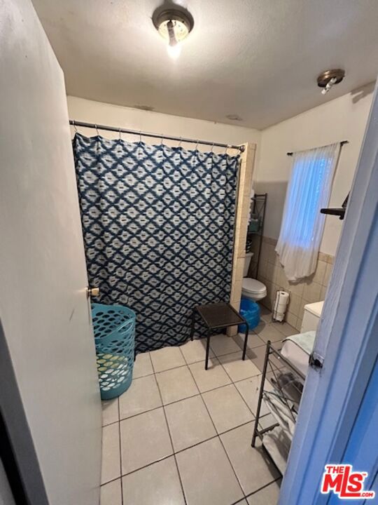 Residential Income for sale at 319 E 113th Street, Los Angeles CA featuring 4 beds and 2 baths