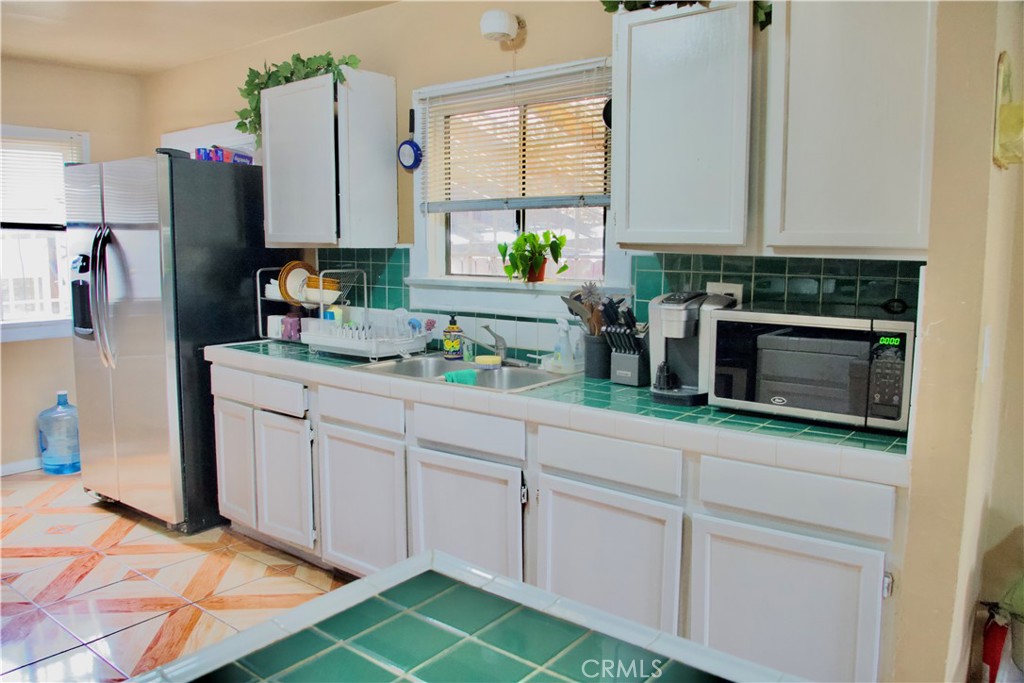 Residential for sale at 837 W 103rd Street, Los Angeles CA featuring 3 beds and 2 baths