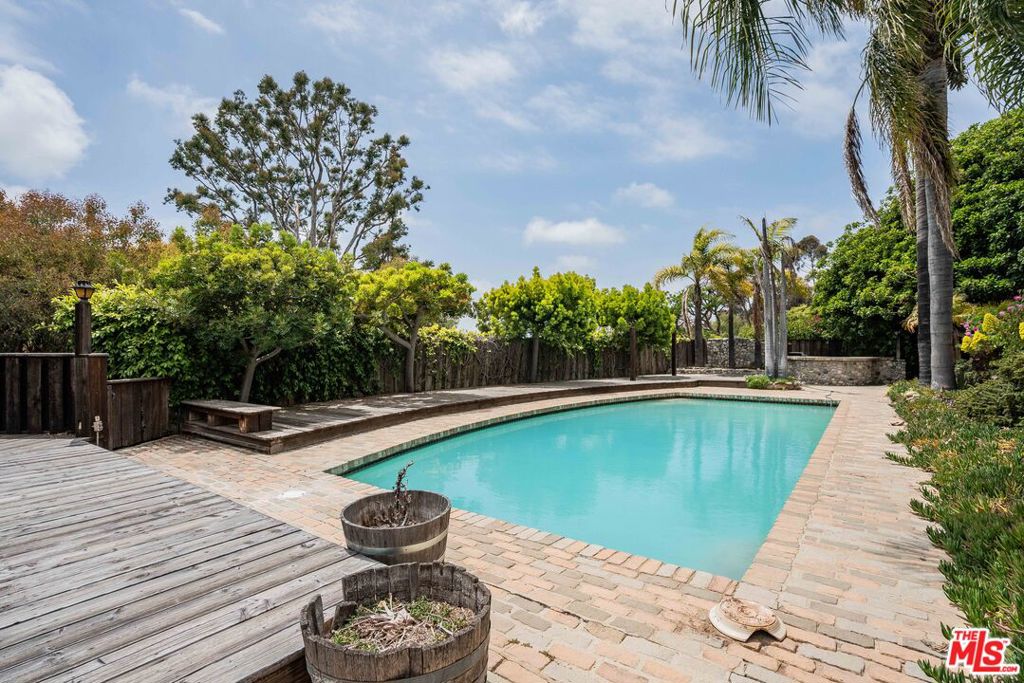 Residential for sale at 560 N Tigertail Road, Los Angeles CA featuring 5 beds and 5 baths