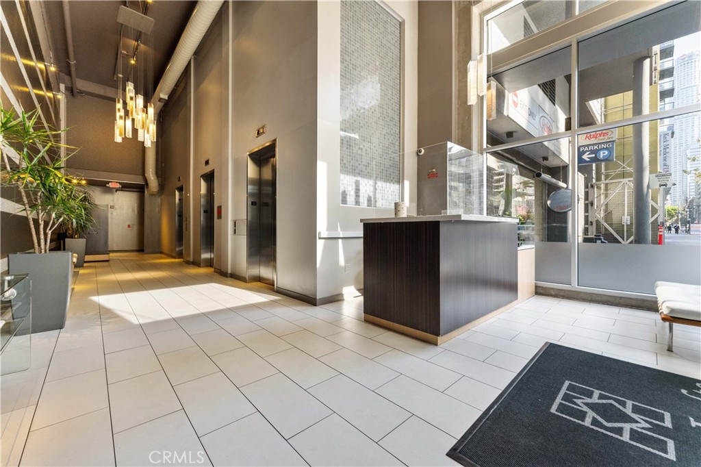 Residential for sale at 645 W 9th Street 703, Los Angeles CA featuring 2 beds and 2 baths