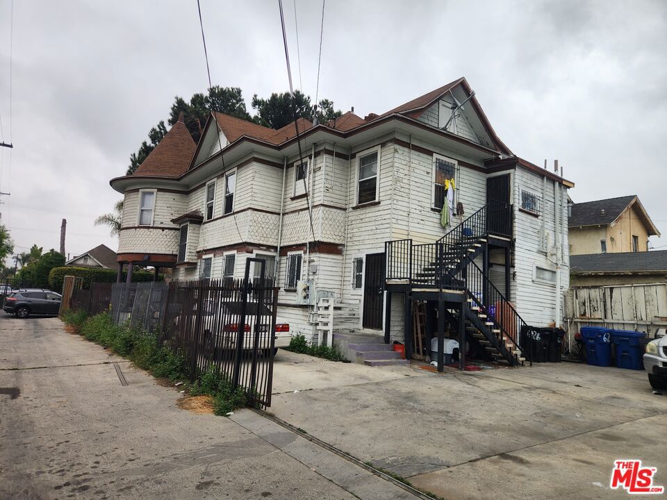 Residential Income for sale at 626 E 54th Street, Los Angeles CA featuring 9 beds and 4 baths
