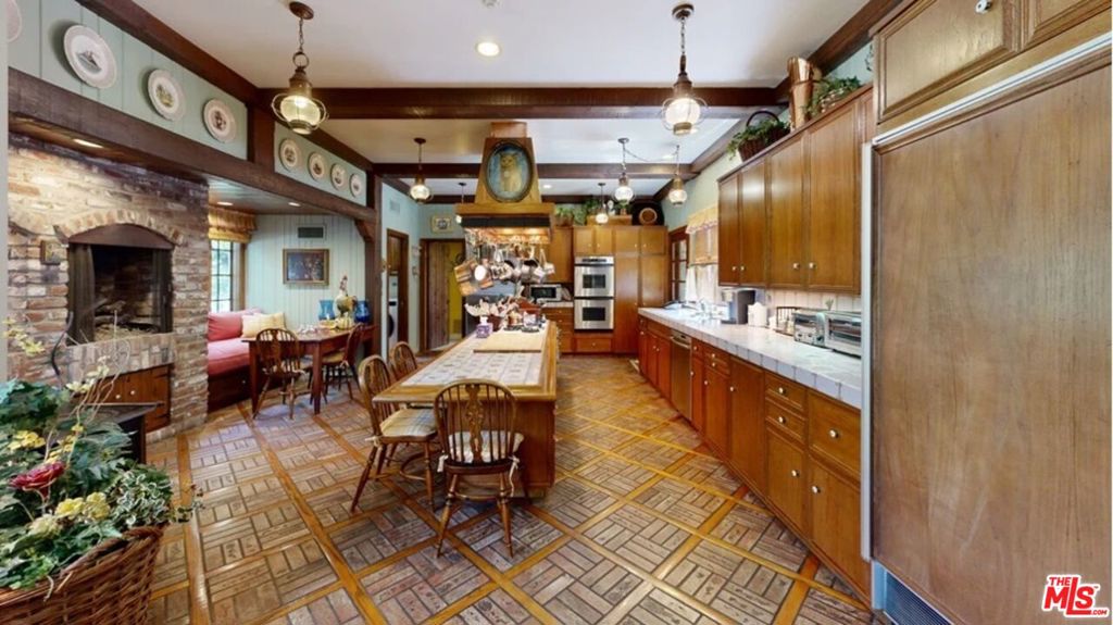 Residential for sale at 570 S Mapleton Drive, Los Angeles CA featuring 5 beds and 9 baths