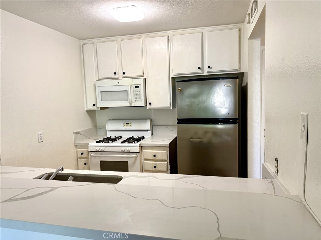 Residential for sale at 7640 Oso Avenue 316, Winnetka CA featuring 1 bed and 1 bath