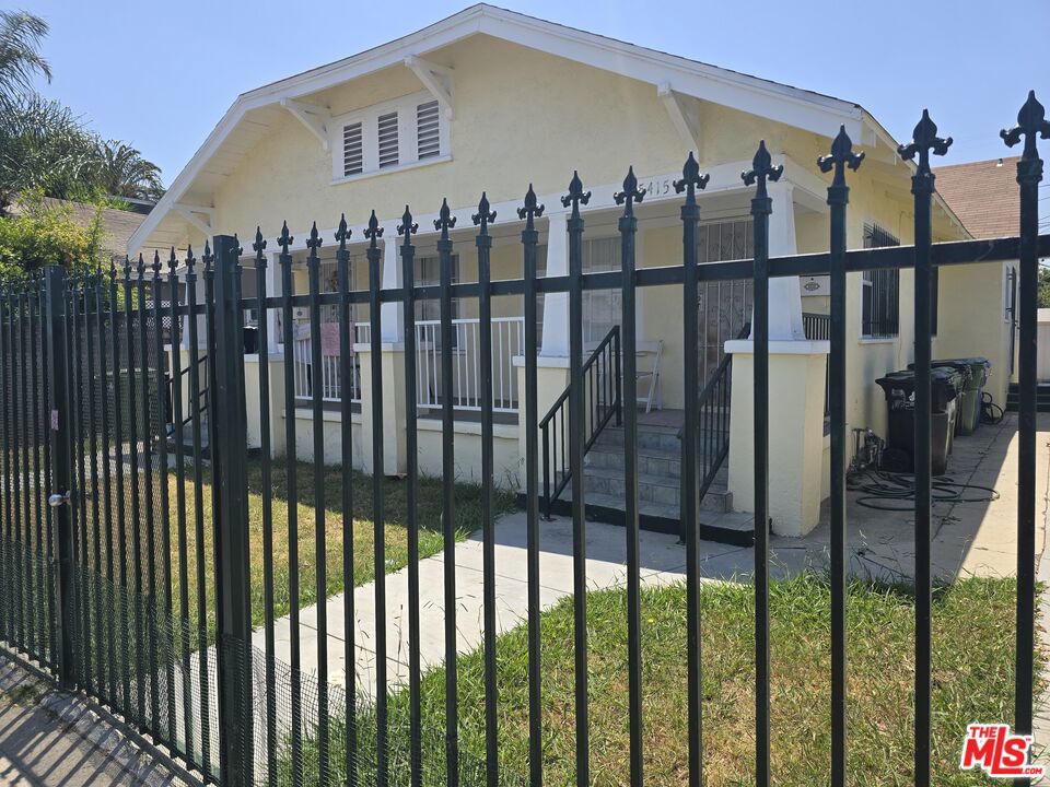 Residential Income for sale at 5415 S Normandie Avenue, Los Angeles CA featuring 2 beds and 2 baths