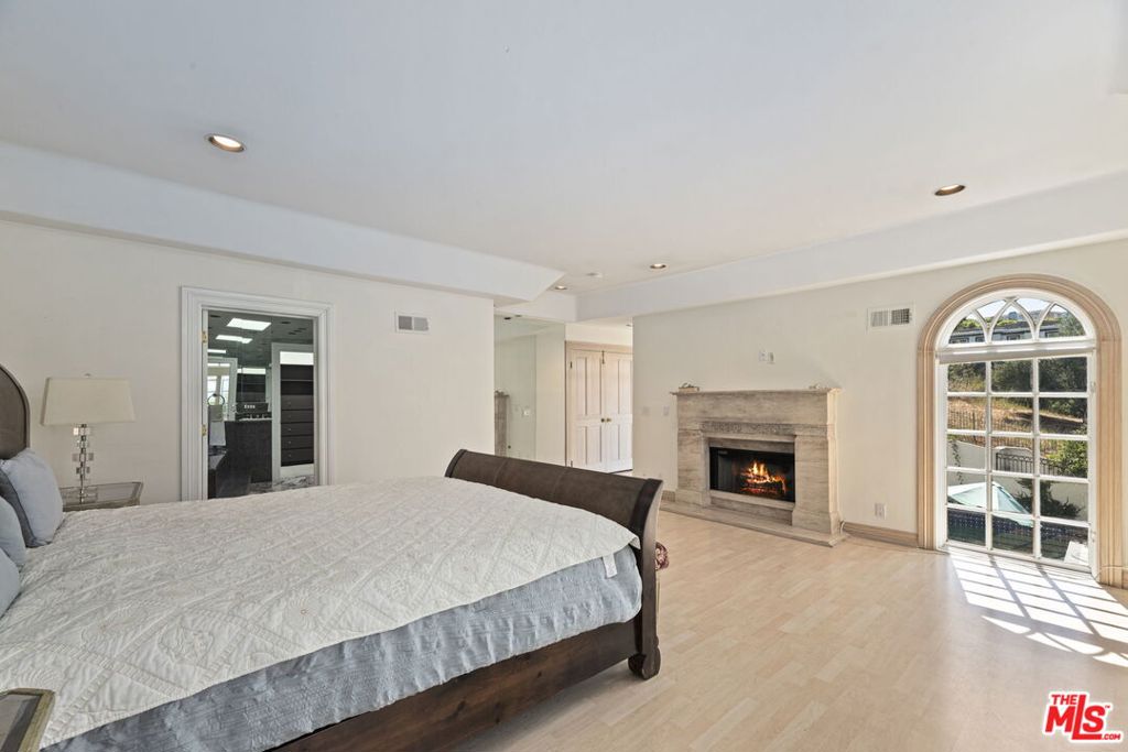 Residential for sale at 14330 Mulholland Drive, Los Angeles CA featuring 5 beds and 5 baths