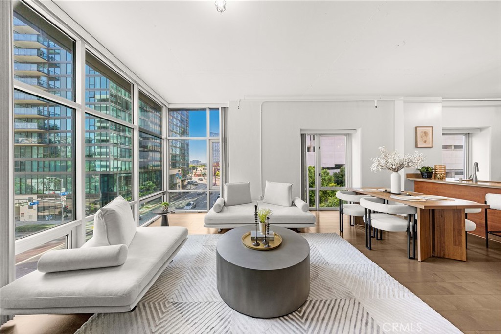 Residential for sale at 645 W 9th Street 303, Los Angeles CA featuring 2 beds and 2 baths