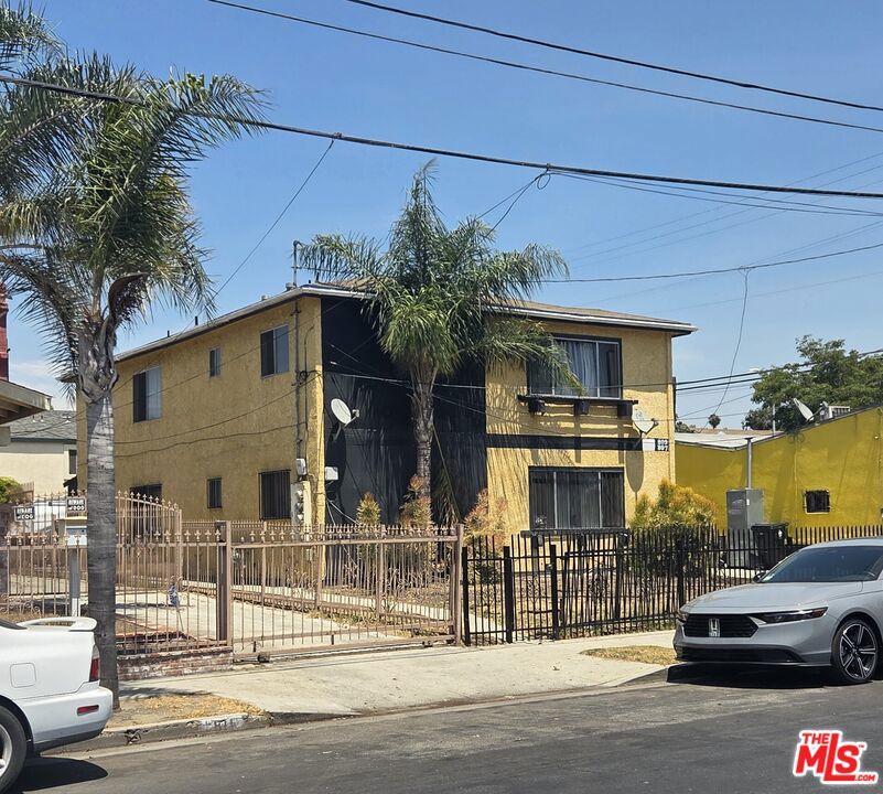 Residential Income for sale at 807 W 48th Street, Los Angeles CA featuring 6 beds and 4 baths