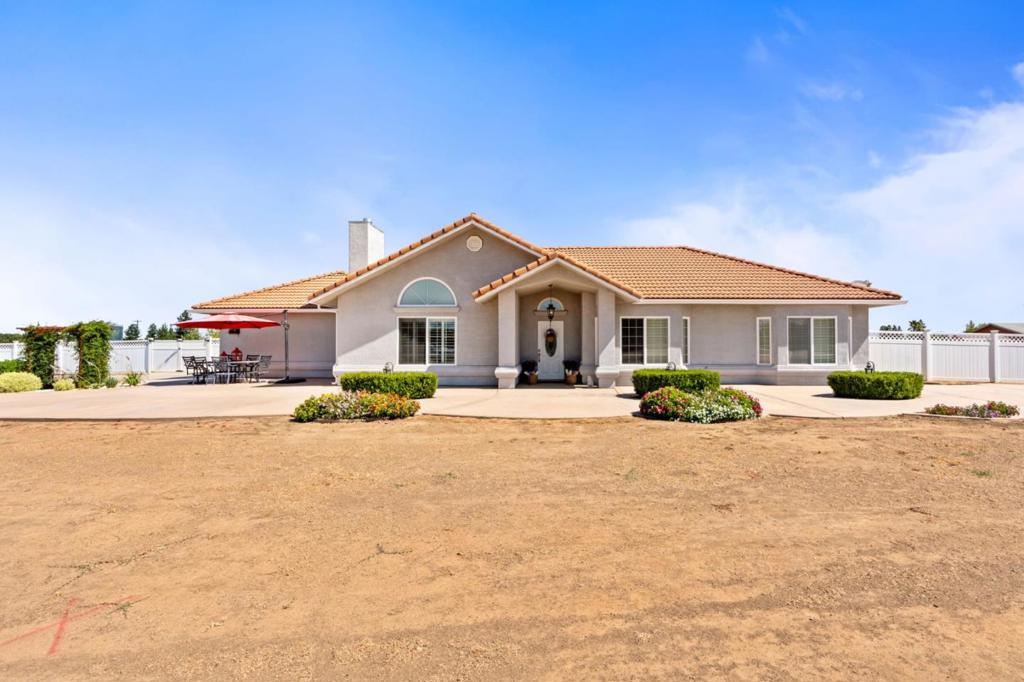 Residential for sale at 28565 Avenue 21, Madera CA featuring 4 beds and 2 baths