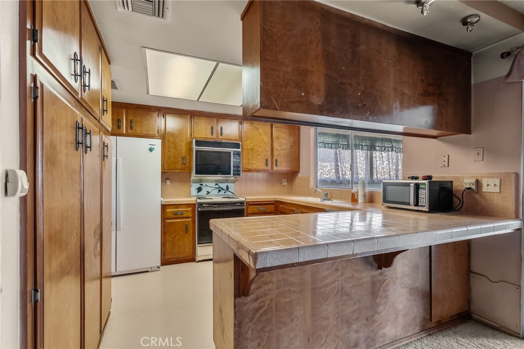 Residential for sale at 7515 Pinon Drive, Yucca Valley CA featuring 3 beds and 2 baths