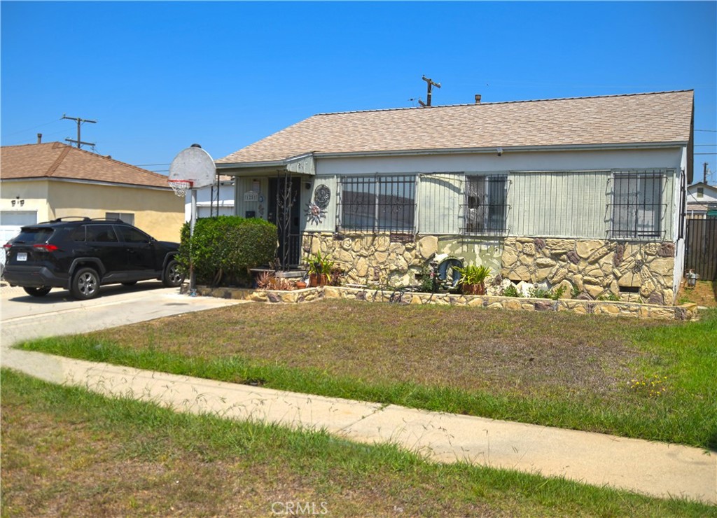 Residential for sale at 1251 W 119th Street, Los Angeles CA featuring 3 beds and 2 baths