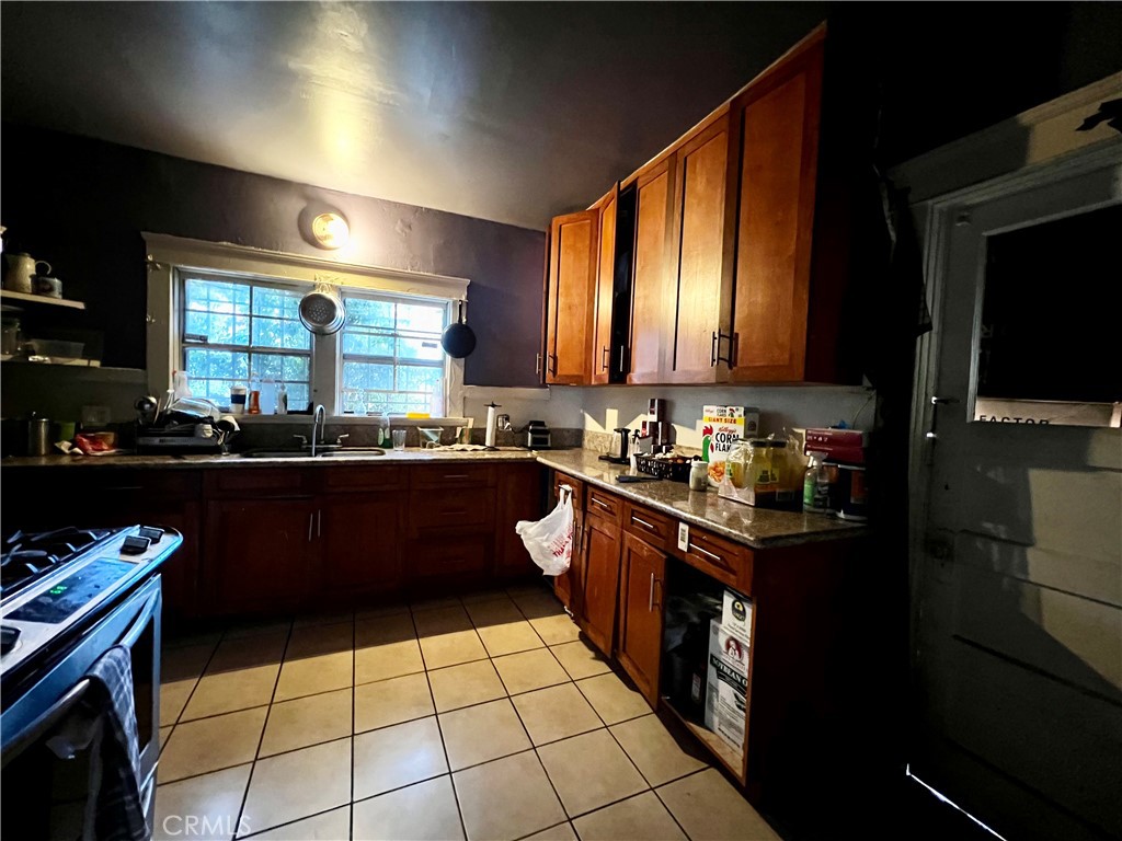 Residential for sale at 1040 W 45th Street, Los Angeles CA featuring 3 beds and 1 bath