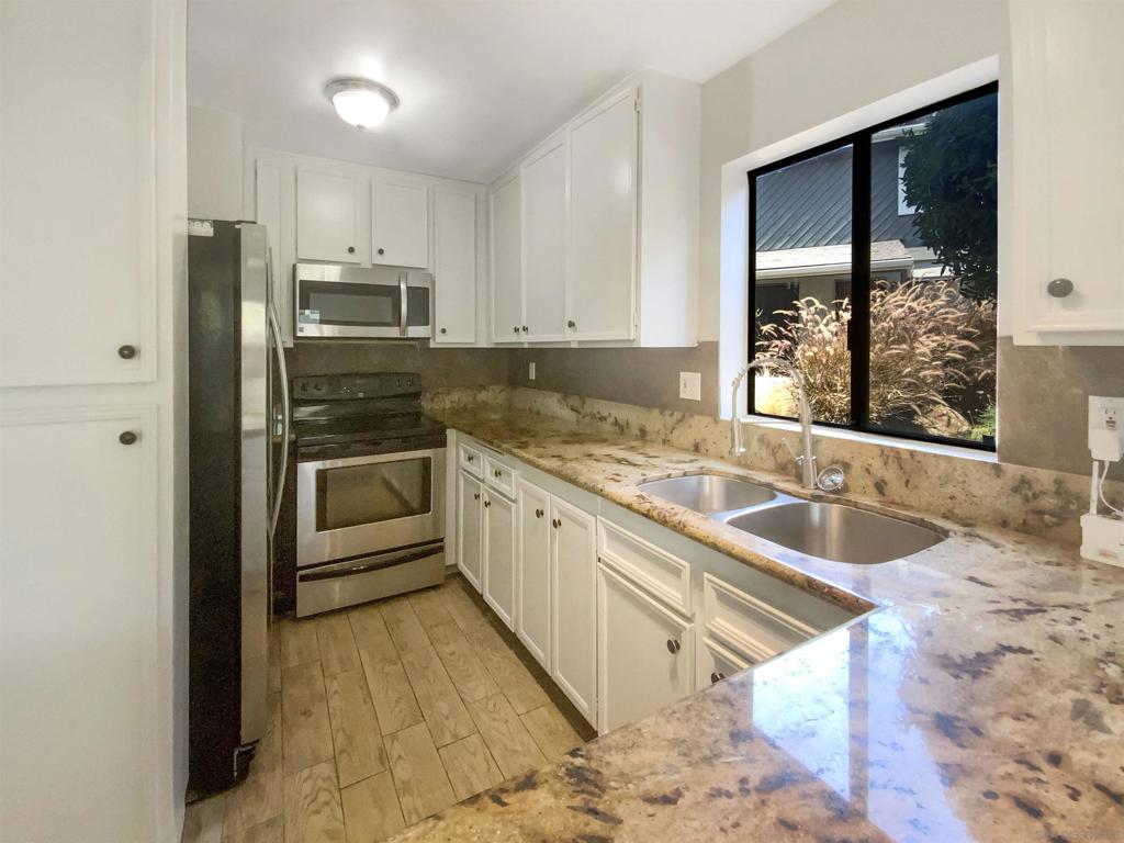 Residential for sale at 5661 Lake Park Way 4, La Mesa CA featuring 2 beds and 2 baths