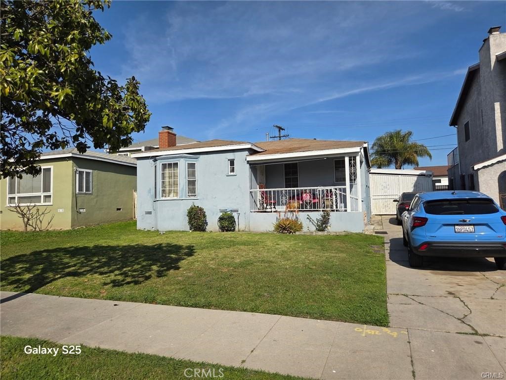 Residential for sale at 10404 S Gramercy Place, Los Angeles CA featuring 3 beds and 3 baths