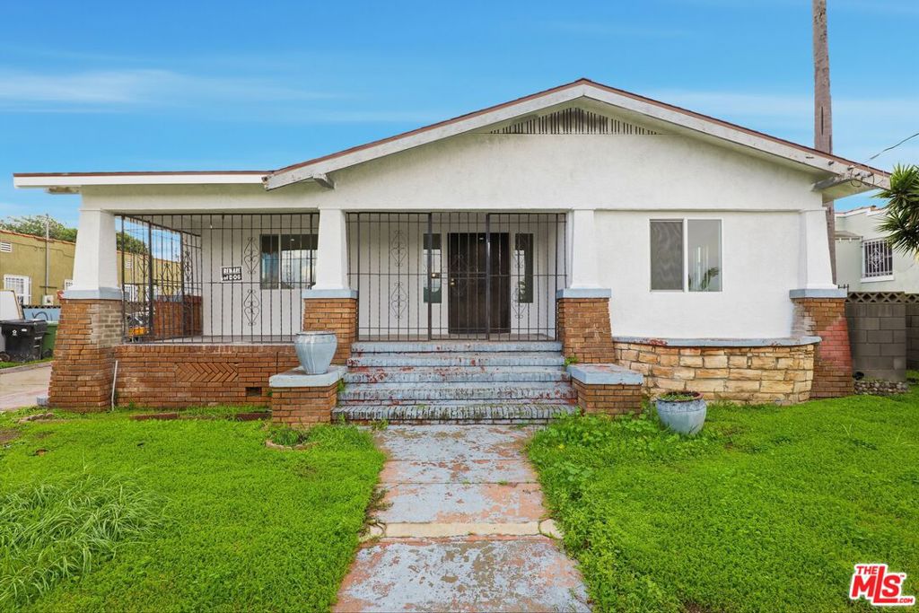 Residential Income for sale at 1526 W 105th Street, Los Angeles CA featuring 6 beds and 4 baths