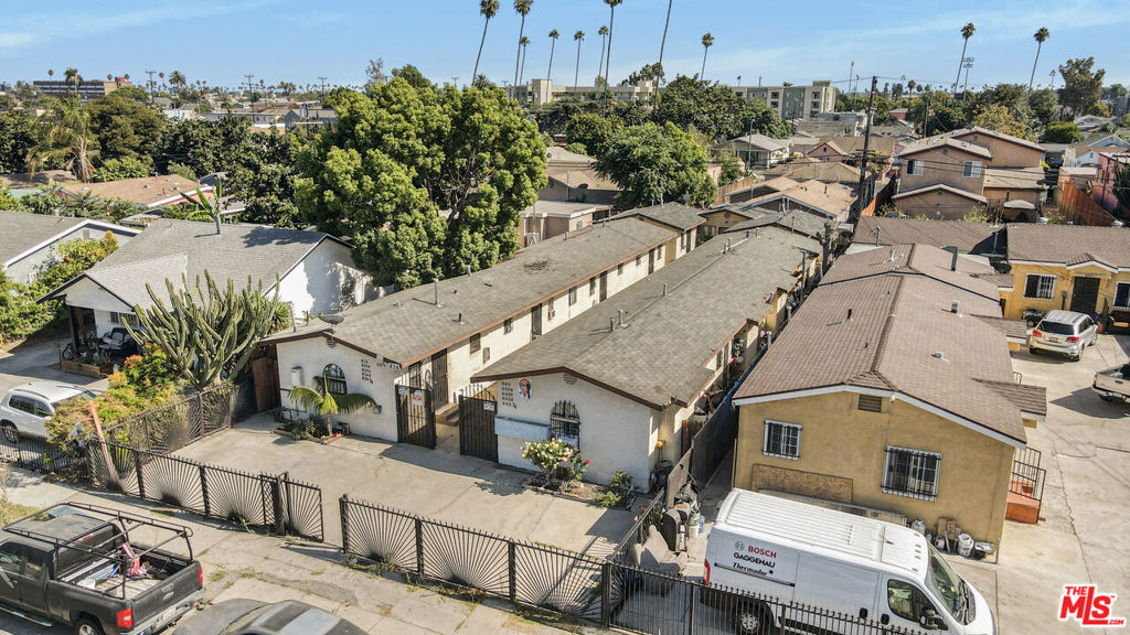 Residential Income for sale at 836 W 66th Street, Los Angeles CA featuring 11 beds and 11 baths