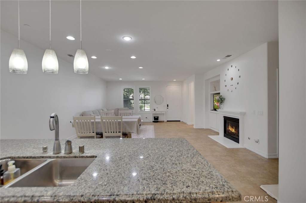 Residential for sale at 15723 Parkhouse Drive 105, Fontana CA featuring 4 beds and 4 baths