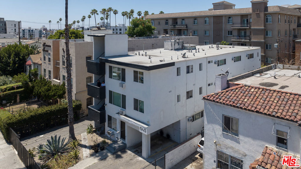 Residential Income for sale at 845 S Kenmore Avenue, Los Angeles CA featuring 8 beds and 12 baths