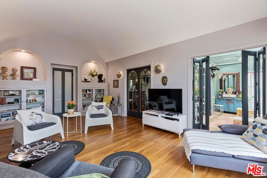 Residential for sale at 100 N Arden Boulevard, Los Angeles CA featuring 4 beds and 3 baths