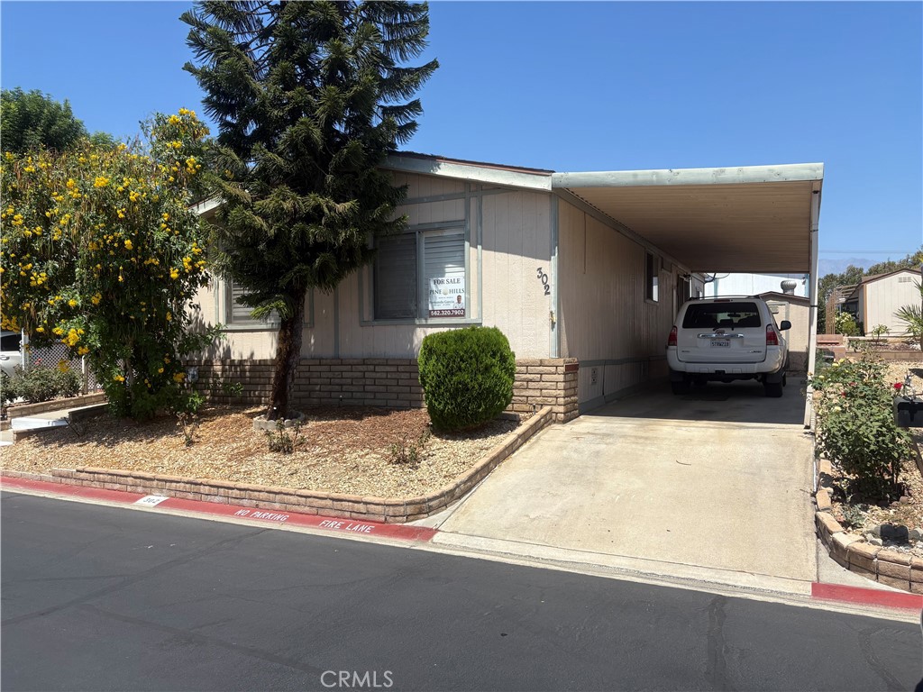 Manufactured In Park for sale at 1456 E Philadelphia St 302, Ontario CA featuring 2 beds and 2 baths