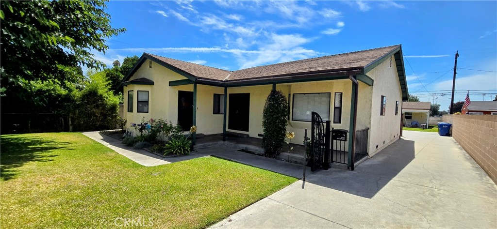 Residential Lease for rent at 8730 N 6th, Downey, Los Angeles County CA featuring 4 beds and 2 baths