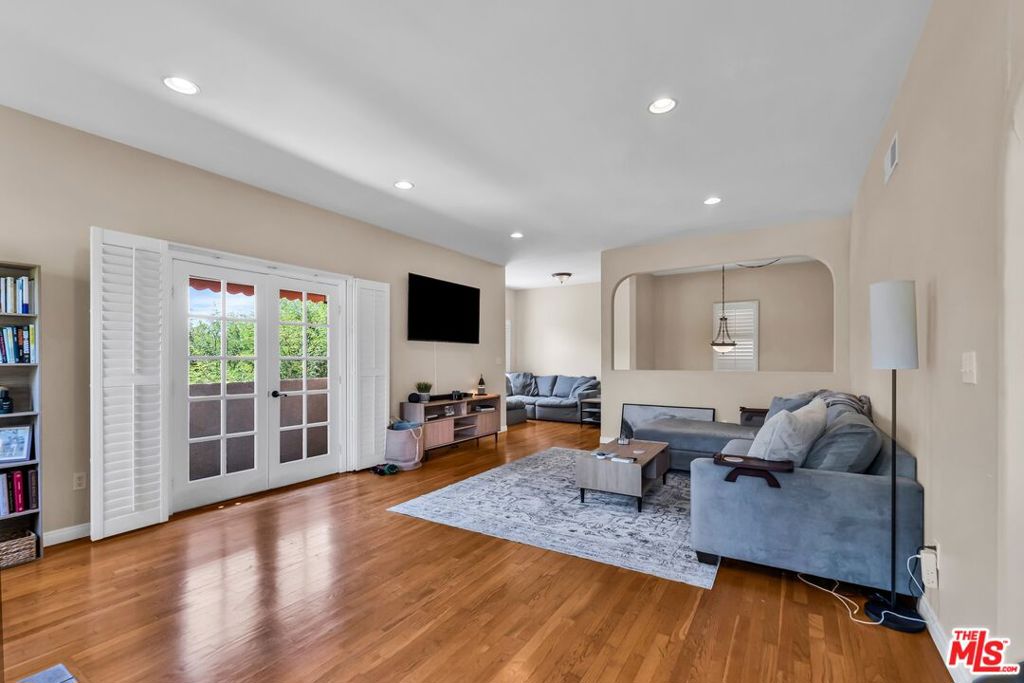 Residential Income for sale at 1073 S Mansfield Avenue, Los Angeles CA featuring 6 beds and 4 baths