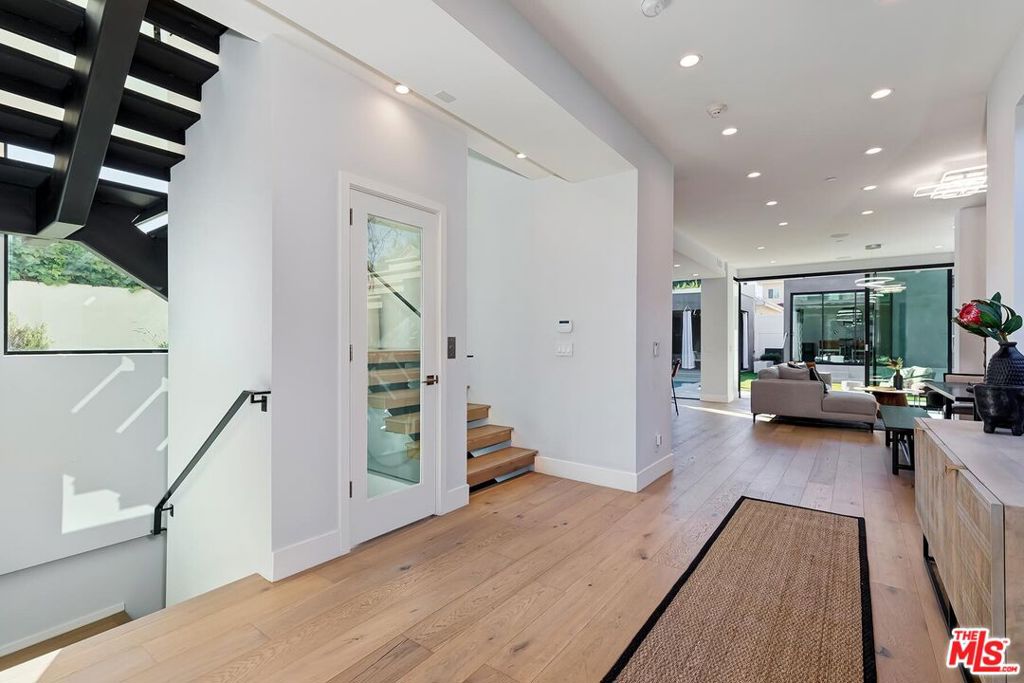 Residential for sale at 489 S Willaman Drive, Los Angeles CA featuring 6 beds and 7 baths