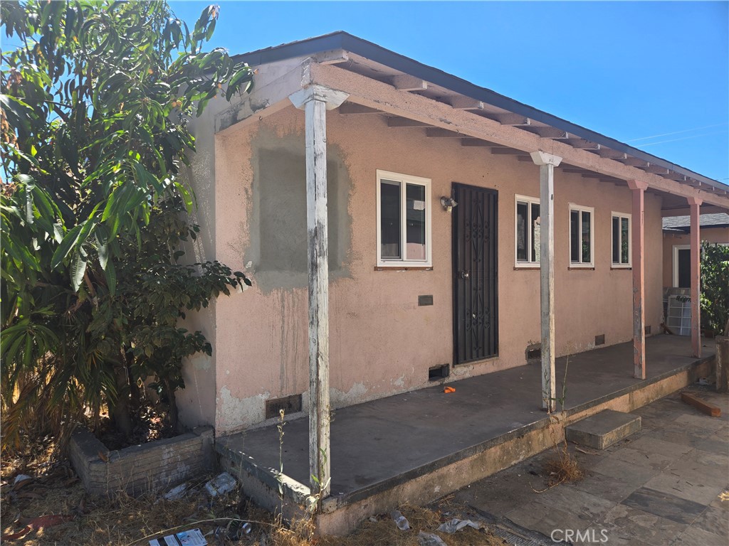 Residential for sale at 8669 San Gabriel Avenue, South Gate CA featuring 3 beds and 2 baths