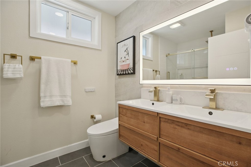 Residential for sale at 1533 W San Lorenzo Ave, Santa Ana CA featuring 5 beds and 3 baths