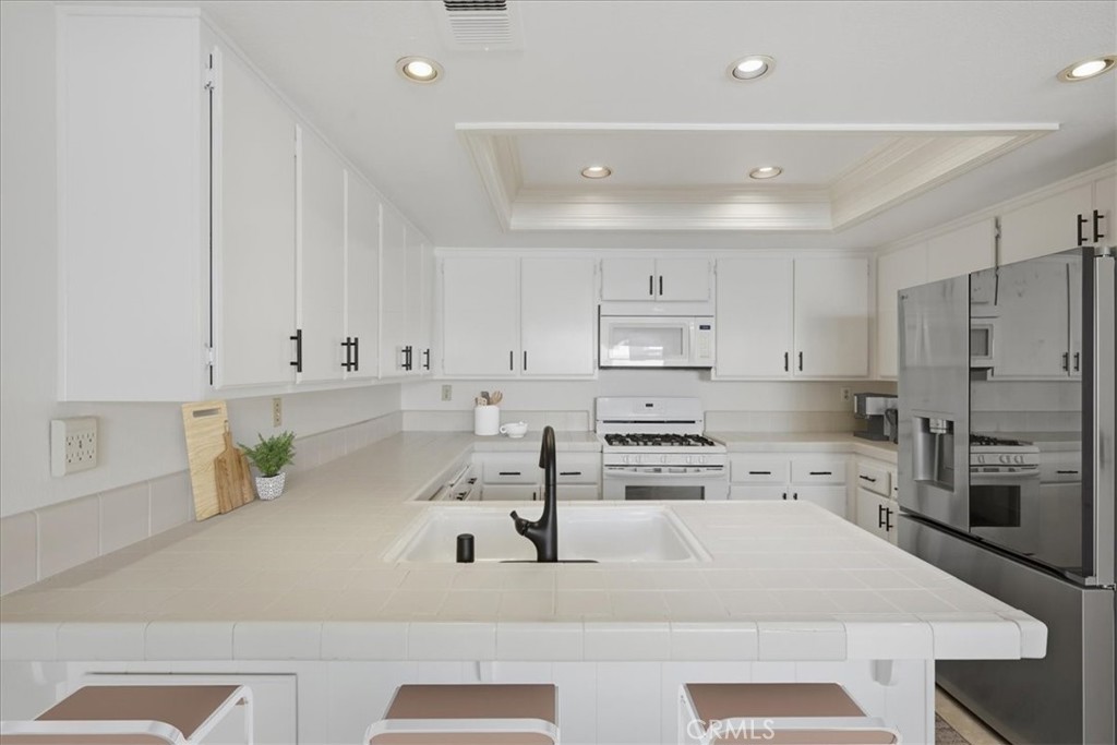 Residential for sale at 23401 Via Linda C, Mission Viejo CA featuring 2 beds and 3 baths