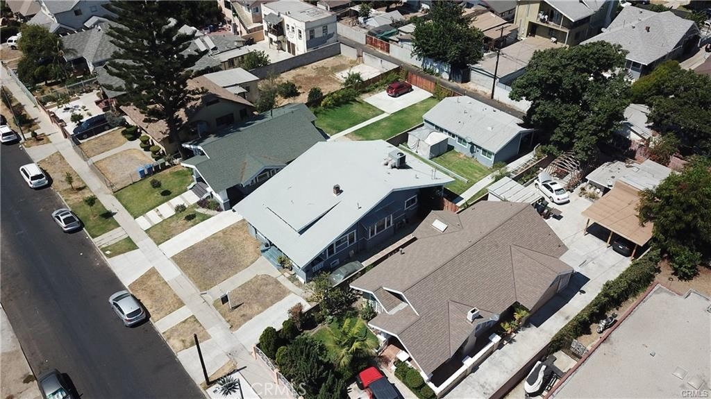 Duplex for sale at 1027 W 46th Street, Los Angeles, CA featuring 5 beds and 4 baths
