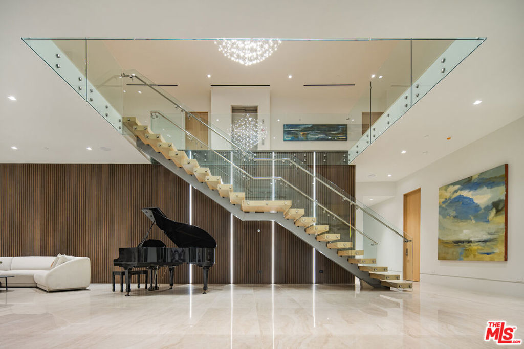 Residential for sale at 822 N Kenter, Los Angeles CA featuring 9 beds and 16 baths