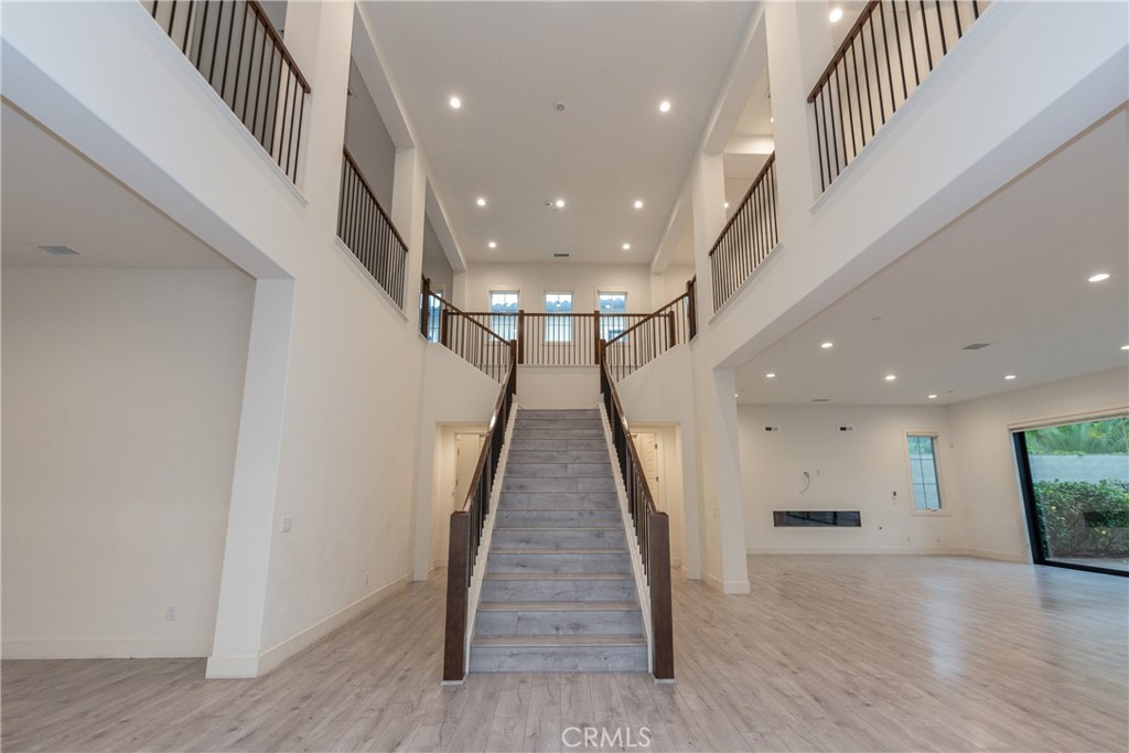 Residential Lease for rent at 93 Spacial, Irvine CA featuring 5 beds and 6 baths