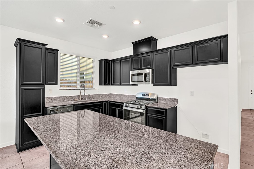 Residential for sale at 664 Amabile, Los Banos CA featuring 4 beds and 3 baths