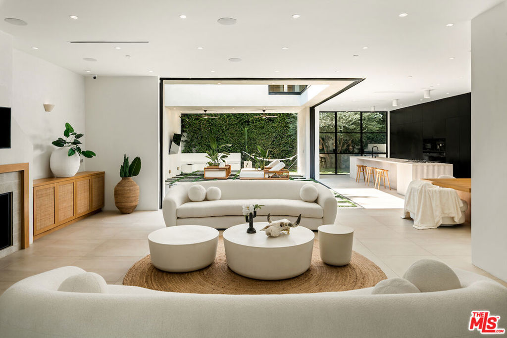 Residential for sale at 839 N Genesee Avenue, Los Angeles CA featuring 5 beds and 6 baths
