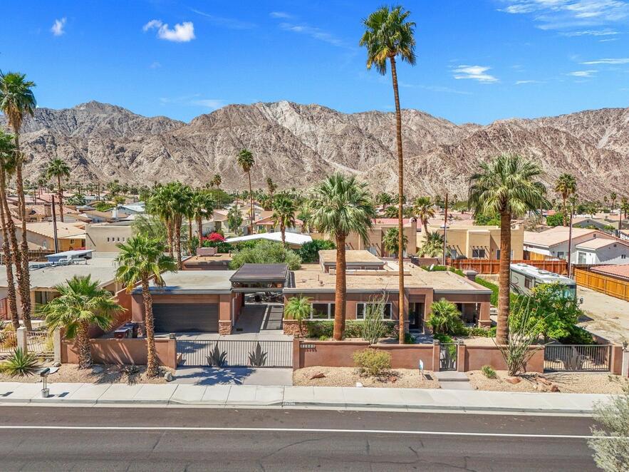 Residential for sale at 52883 Eisenhower Drive, La Quinta CA featuring 5 beds and 4 baths