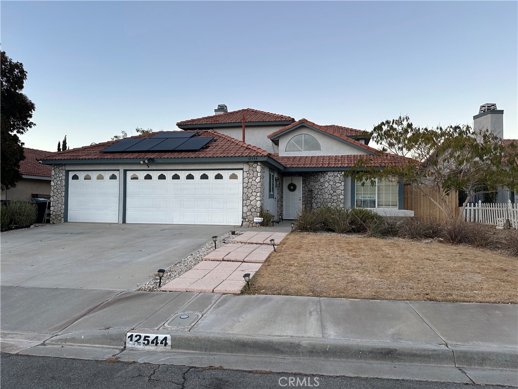 Residential for sale at 12544 Sunbird Lane, Victorville CA featuring 4 beds and 3 baths