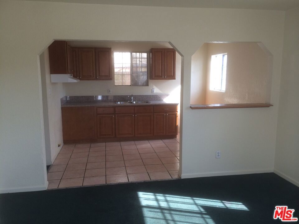 Residential Income for sale at 1031 W Century Boulevard, Los Angeles CA featuring 6 beds and 2 baths