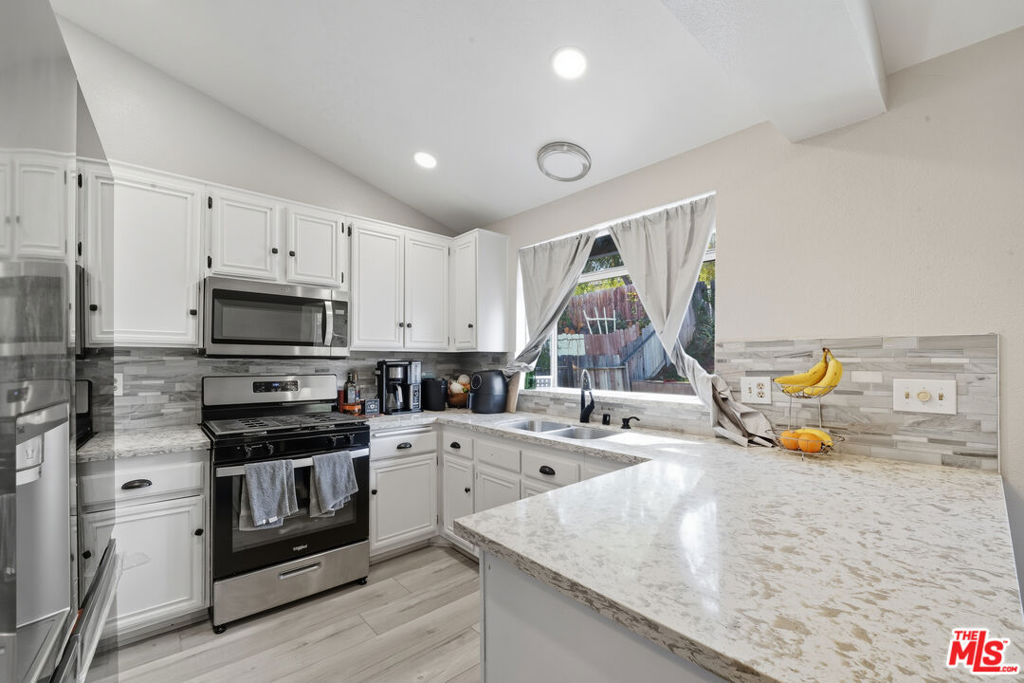 Residential for sale at 2048 E Avenue R10, Palmdale CA featuring 3 beds and 2 baths