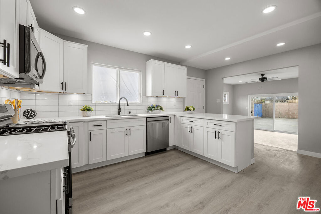 Residential for sale at 403 E 91st Street, Los Angeles CA featuring 3 beds and 2 baths