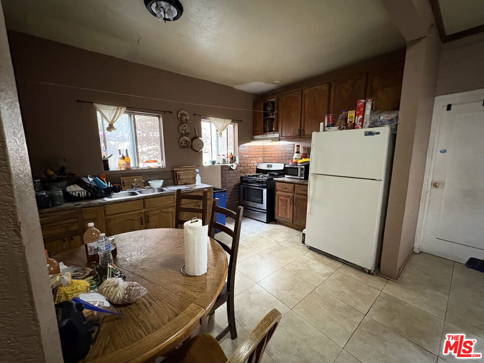 Residential Income for sale at 2006 S Harcourt Avenue, Los Angeles CA featuring 12 beds and 6 baths
