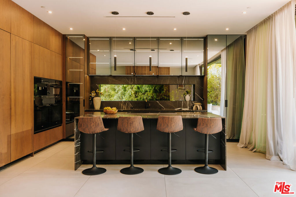 Residential for sale at 515 N Harper Avenue, Los Angeles CA featuring 4 beds and 5 baths
