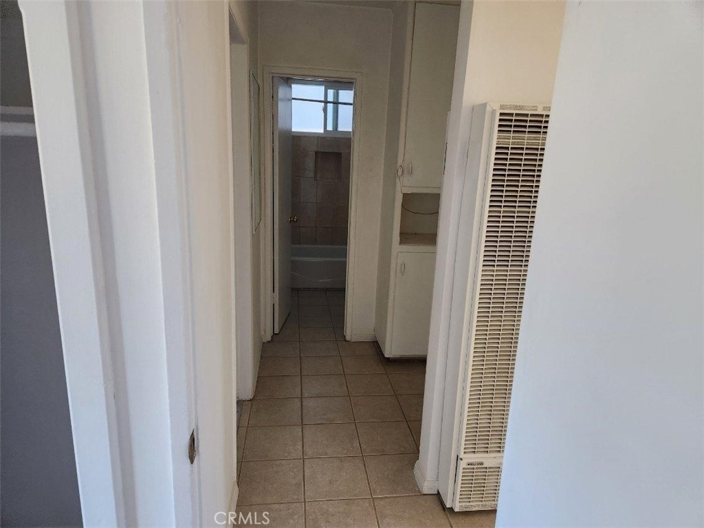 Residential Lease for rent at 15718 1/2 Larch Avenue, Lawndale CA featuring 4 beds and 3 baths